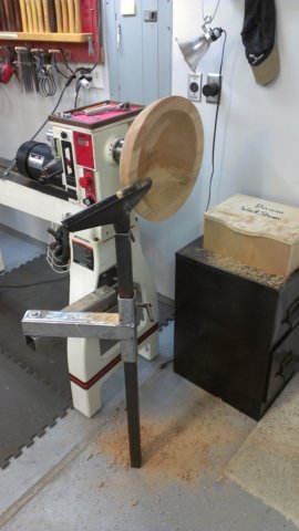 Outboard lathe store tool rest